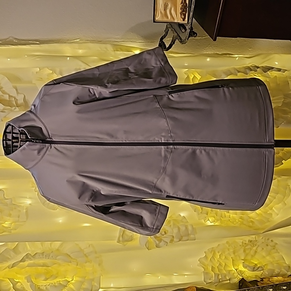 Nike lavender rain golf zip up jacket, size MT or ML.